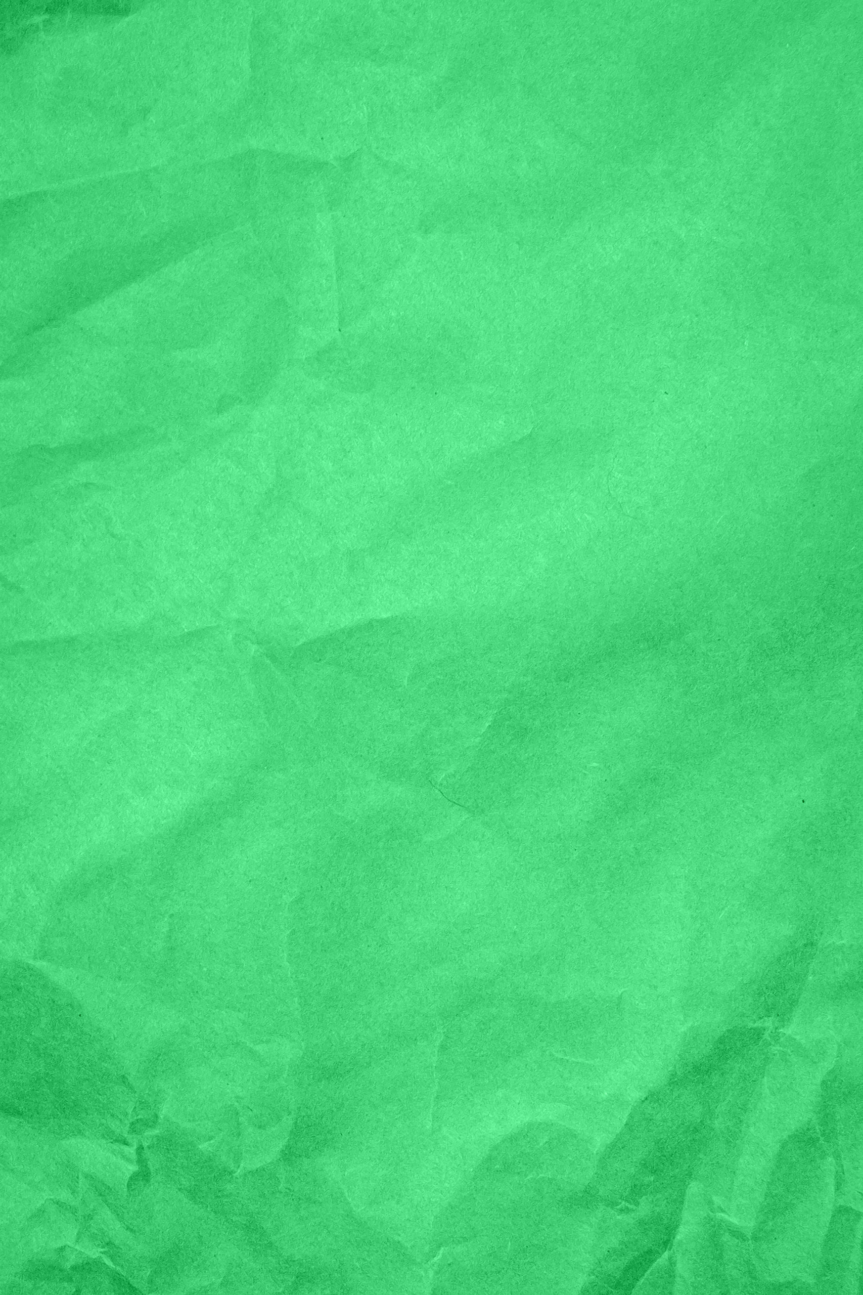 Grön pappersbakgrund med ren och enkel bakgrund, perfekt för text eller design
